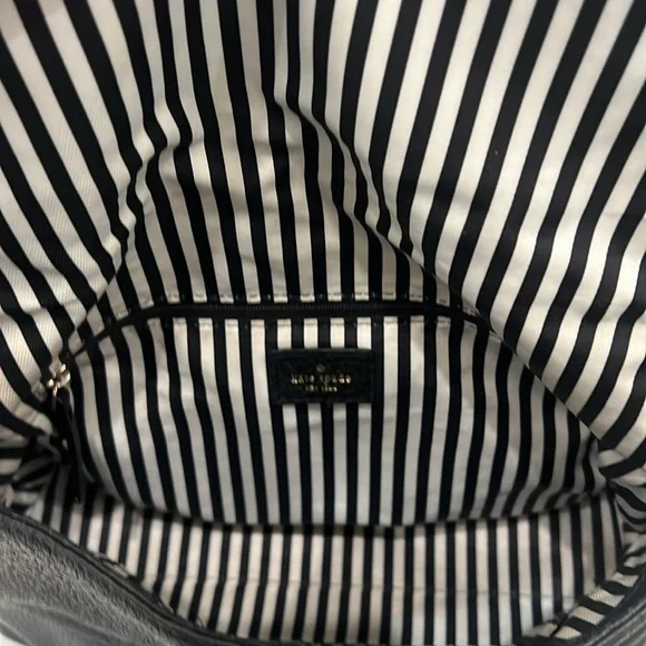 Kate spade everyday purse black leather with removable strap.